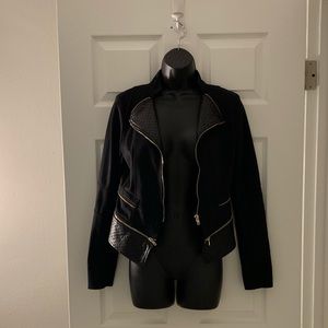 Black jacket with gold zippers